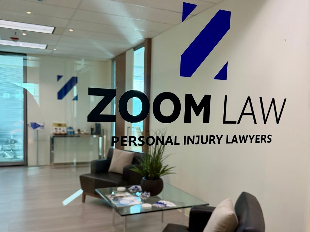 Zoom Law reception with etched-glass signage